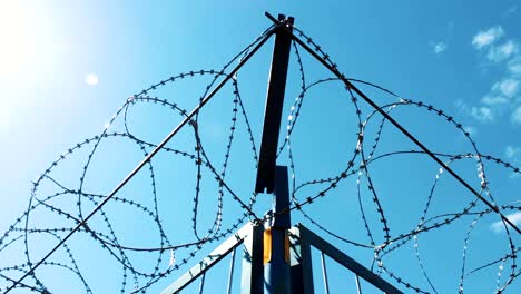 Barbed-wire-around-the-forbidden-territory.-Closed-territory.-Warning-of-danger.-Barbed-fence