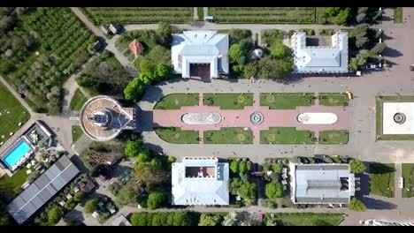 Panoramic-video-shooting-from-the-drone-above-the-central-square-of-the-National-Exhibition-Center-in-Kiev,-Ukraine.-Dolly-out-motion-view-from-drone-in-FullHD