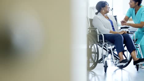 African-American-female-nurse-and-patient-in-wheelchair