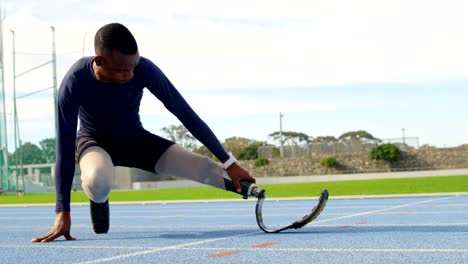 Disabled-athletic-exercising-on-a-running-track-4k