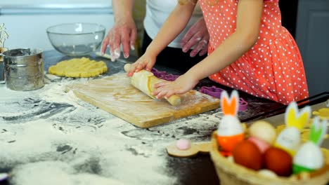 Girl-and-Grandma-Preparing-Dough-for-Cookies