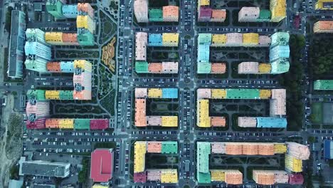 Top-view-of-the-colorful-buildings,-aerial-footage-from-the-drone-on-Comfort-Town.-Kiev,-Ukraine.