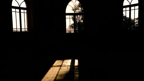 Window.-The-sun's-rays-shine-through-the-old-window-in-the-room.