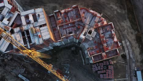 Flight-over-the-construction-site,-at-dawn,-4k-drone-view