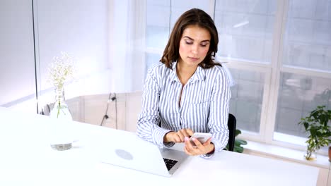 Busy-Young-Woman-Using-Smartphone,-Typing-Message