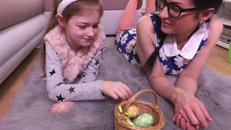 Mother-and-daughter-sorting-decorative-Easter-eggs