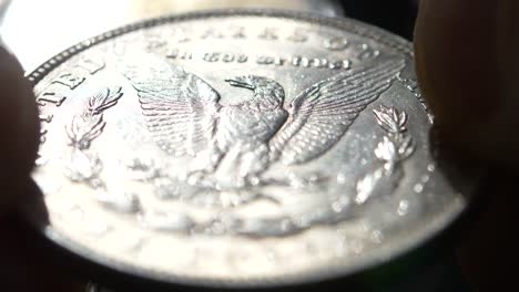 Checking-American-Dollars-Coin-in-Macro-Closeup.-Collectible-Coin-in-a-Hand.