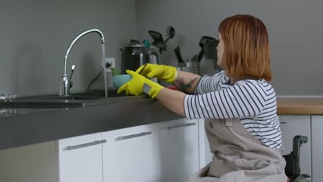 Woman-in-Wheelchair-Washing-Dishes