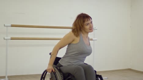 Woman-in-Wheelchair-Dancing-Energetic-Dance-with-Male-Partner