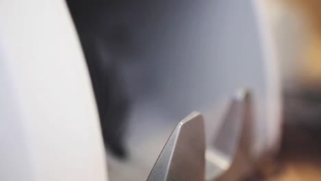 hand-taking-money-from-counting-machine