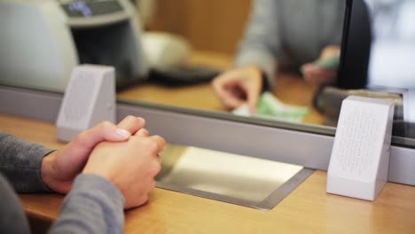 clerk-counting-money-and-customer-at-bank-office