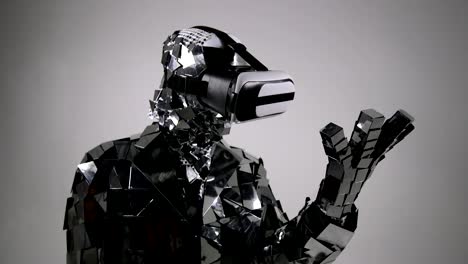 Futuristic-Robot-in-mirror-costume-vorking-with-virtual-interface,-touching-interface-by-index-finger.