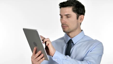 Businessman-Browsing-Internet-on-Tablet