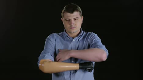 Man-with-Prosthetic-Arm-Having-Headache