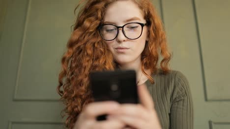 Girl-with-Curly-Hair-Texting