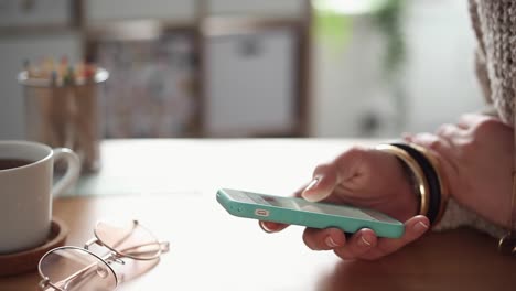 Young-Woman-Scrolling-her-Smartphone