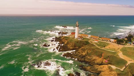 Light-House-Drone-Shot-Aerial-Helicopter-View-Ocean-Coast-Line-with-crashing-waves-sun-set-4K