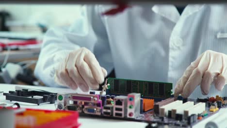 Hands-of-the-master-repair-of-computer-technology-and-microchips