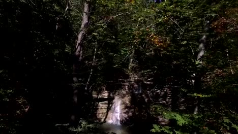 Drone-Aerial-Shot-Approach-to-Waterfall-with-Swimming-Hole-in-Gelendzhik-in-Russia