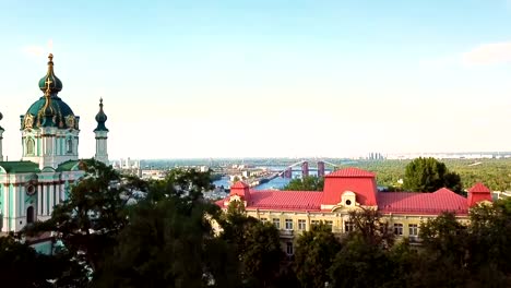 St-Andrew's-Church,-Kiev-Ukraine.-View-from-above.-aerial-photo.-Kiev-attractions.-video-footage.-camera-rises-from-the-bottom-up.-panaramic-view-to-Podil