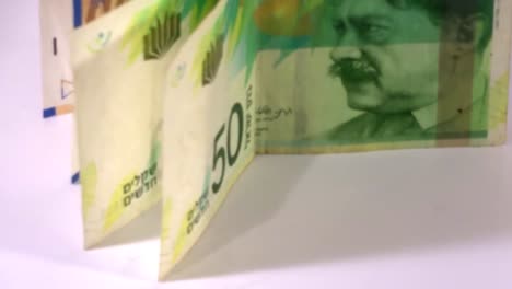 Israeli-money,-50-shekels-in-a-circular-motion