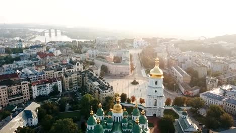 Saint-Sophia's-Cathedral,-square.-Kiev-Kiyv-Ukraine-with-Places-of-Interest.-Aerial-drone-video-footage.-Sunrise-light.-City-panarama.-Summer-time.-Dnipro-river-and-bridge.-City-center