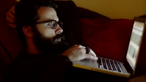 Man-With-Glasses-Using-Tablet-Computer