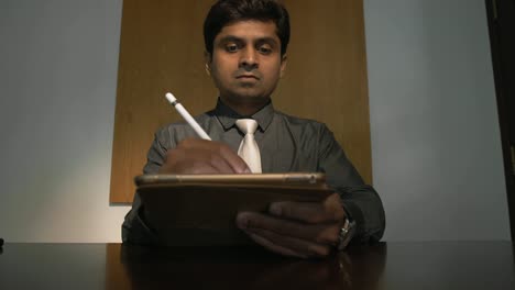 Indian-Businessman-Signing-Contract-Electronically