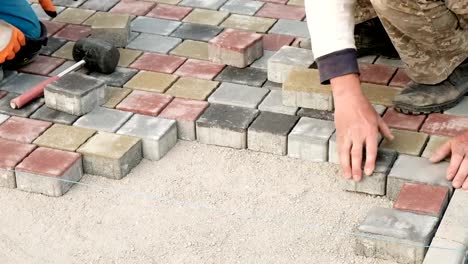 Laying-Paving-Slabs-By-Mosaic-Close-Up.-Road-Paving,-Construction.