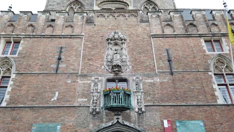 View-of-the-Gruuthuse-Palace.-The-area-is-farther-by-the-palace.-Tourists-walk.