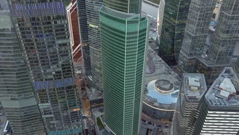 Flying-over-glass-skyscrapers