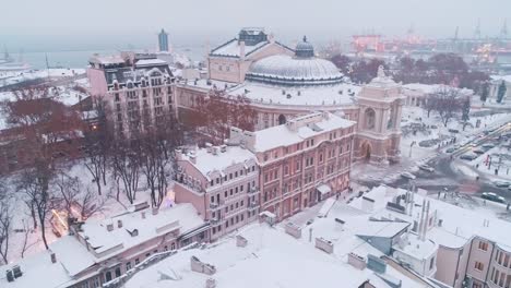 Aerial-view-on-Odessa-city-center-with-sea-port-lights-at-winter