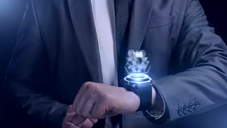 Un-hombre-en-traje-trabaja-con-el-reloj-inteligente-del-futuro