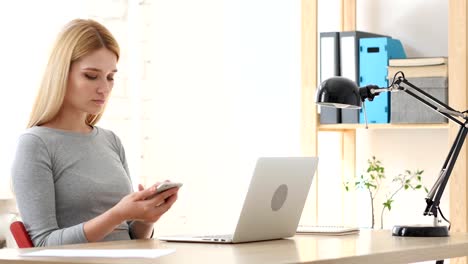 Young-Woman-Using-Smartphone,-Texting-Message