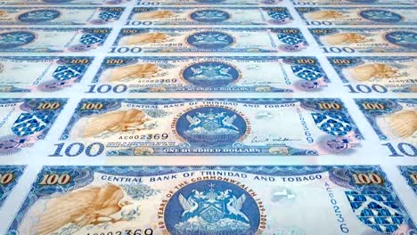 Banknotes-of-one-hundred-dollars-of-Trinidad-and-Tobago,-cash-money,-loop