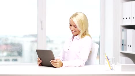 businesswoman-or-student-with-tablet-pc-computer-at-office