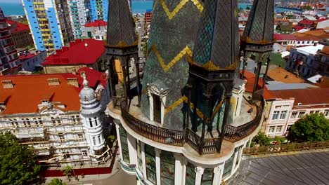 Observation-deck-of-Astronomical-clock-tower-in-Batumi-against-Europe-Square