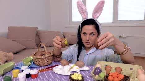 Woman-playing-with-Easter-eggs