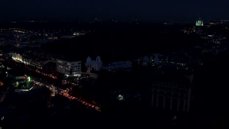 Aerial-shooting-night-city-Kiev-and-St-Andrew's-Church,-Europe,-Ukraine