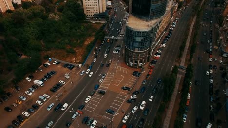 Top-down-aerial-view-of-intersection-with-a-lot-of-cars