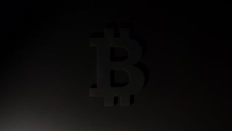 Moving-light-illuminates-bitcoin-symbol