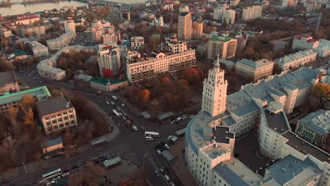 Aerial-panoramic-view-of-midtown-of-Voronezh-city-at-sunset,-Russia.-Famous-buildings-and-urban-architecture-with-roads-and-car-traffic