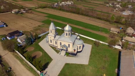 Orthodox-church-in-the-Ukrainian-village.-Aerial-view.