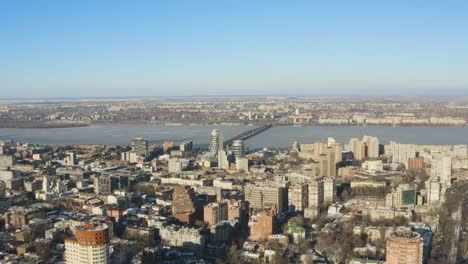 Urban-bird's-eye-view-of-Dnipro-city-skyline.-Winter-cityscape-background.