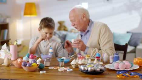 Boy-and-Grandfather-Preparing-for-Easter-Together