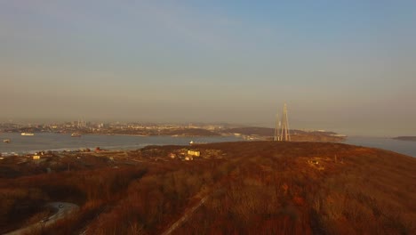 Aerial-survey-of-marine-landscape-with-views-of-the-Russian-bridge.-Vladivostok,-Russia