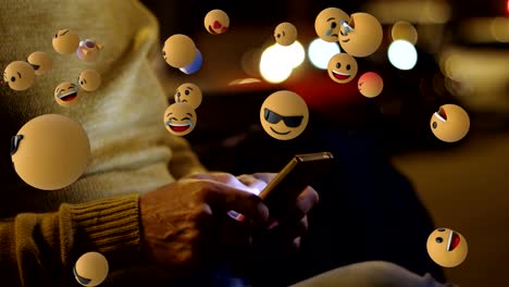 Emoji-Symbole-mit-einem-Mann-mit-Smartphone-im-Hintergrund-4k