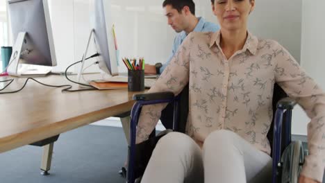 Young-man-and-woman-working-in-a-creative-office