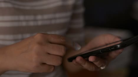 Close-up-woman-hands-using-mobile-smart-phone-for-communication.