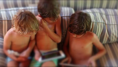 Children-using-tablet-device-at-home--candid-and-authentic